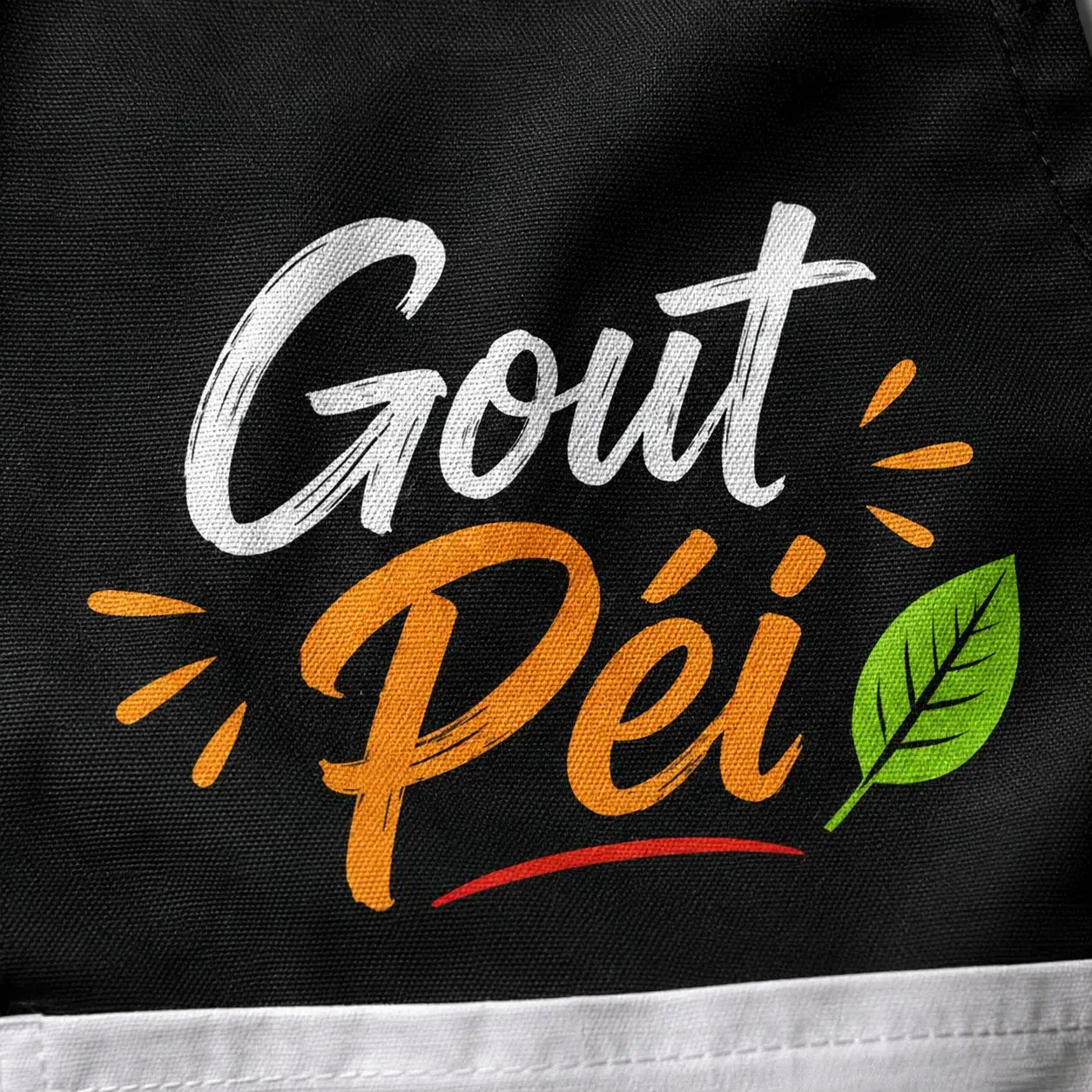 Tablier NDC — Goût Péi noir - zoom slogan